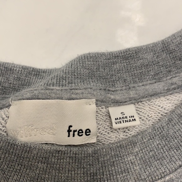 This is a crop sweater, worn but no stains. - Picture 2 of 3